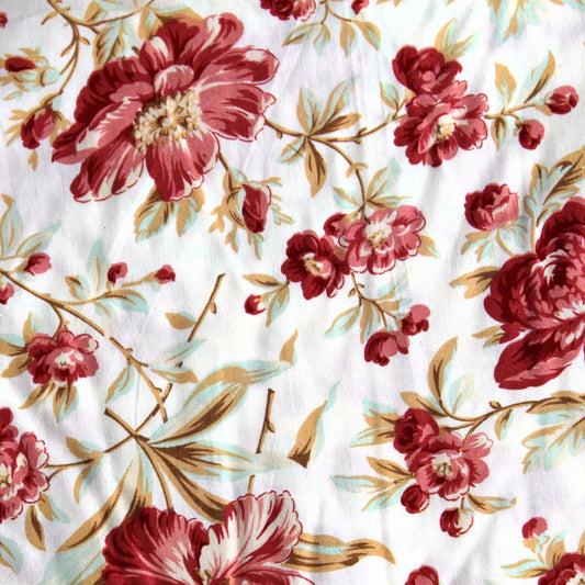 white and red floral backing fabric