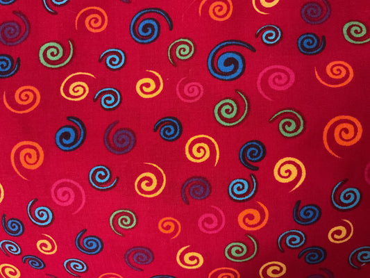1 metre of 108" Extra Wide Quilting Backing Fabric - red with colourful swirls